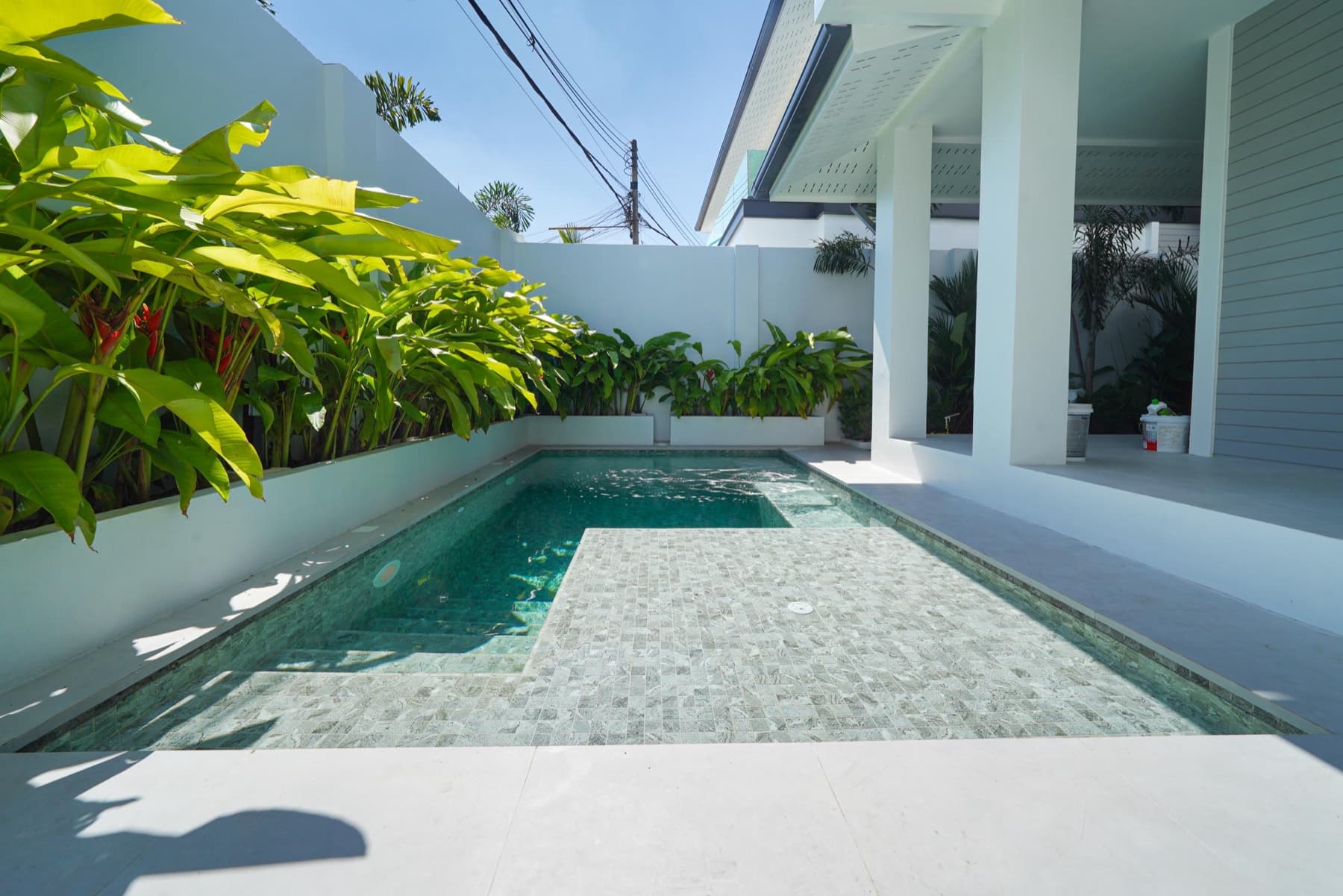 Saltwater, with remote lighting and jacuzzi jets.
